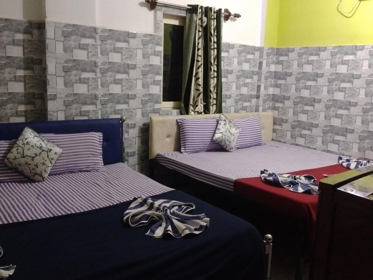 Baga F Leisure Stay Guest House Bagian luar foto